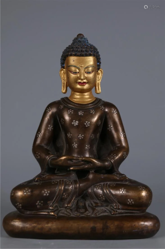 A BRONZE SAKYAMUNI BUDDHA STATUE