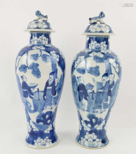 Pair of Chinese blue and white vases and covers, decorated w...