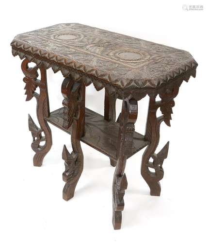 Far Eastern carved hardwood two-tier table, the top carved w...