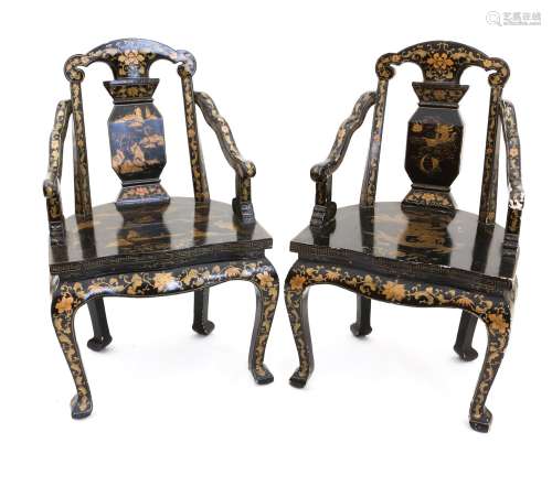 Pair of Chinese black lacquered and gilt decorated armchairs...