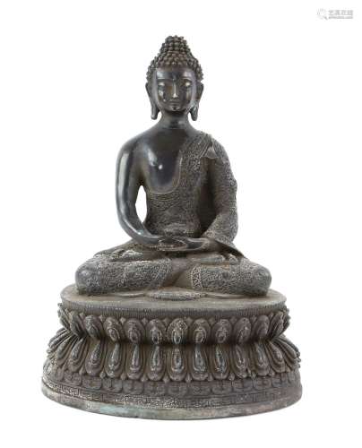 Cast bronze figure of Buddha on a lotus throne, 20th century...