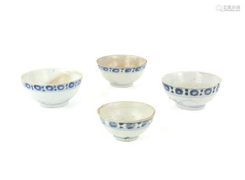 Four Chinese blue and white bowls with stylised decoration, ...