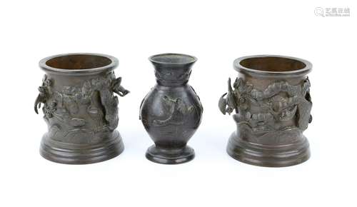 Pair of Japanese cast metal vases with applied decoration of...