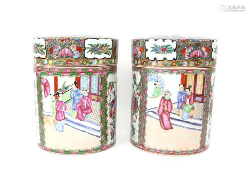 Pair of 20th century famille rose cylindrical jars and cover...