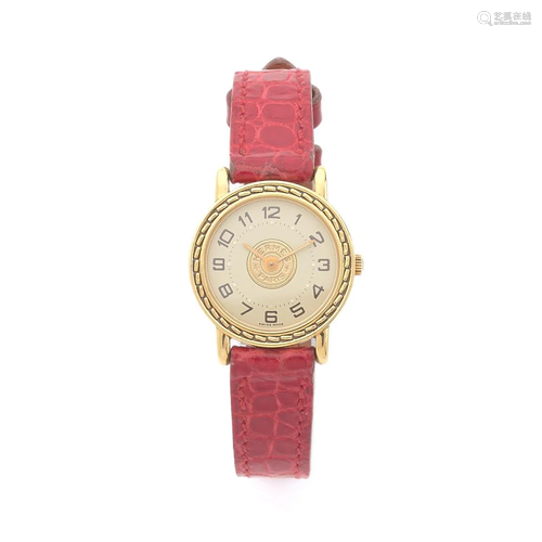 HERMES SELLIER PM A 18K gold quartz wriswtatch by