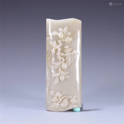 A Carved Jade Peach Shaped Decoration