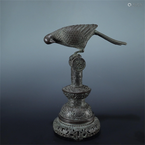 A Bronze Dove Shaped Ornament