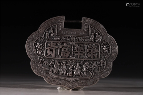 A Silver Figure Patterned Pendant