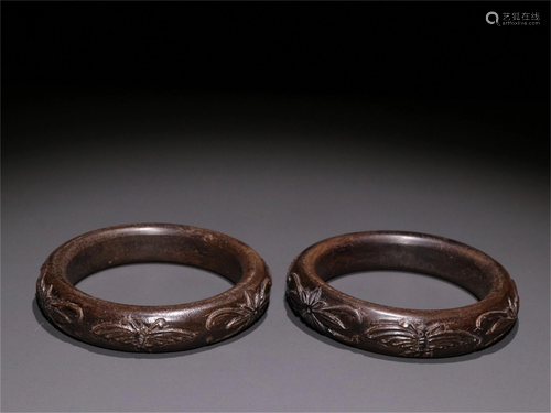 A Pair of Carved Agarwood Bracelets