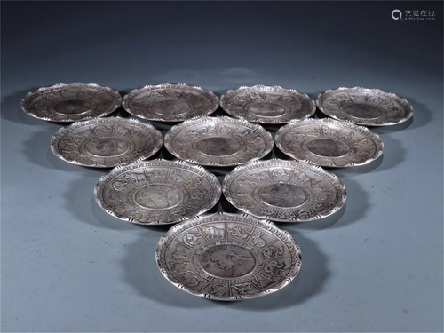 A Set of Gilt Silver Plates