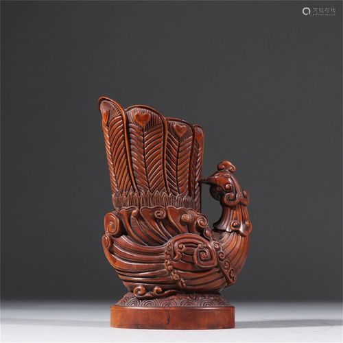 A Carved Hardwood Phoenix Shaped Cup