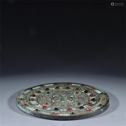 A Bronze Mirror with Turquoise Inlaid