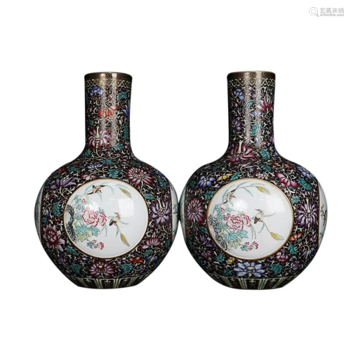 PAIR OF BLACK-GLAZED AND PAINTED ENAMEL 'BIRD AND