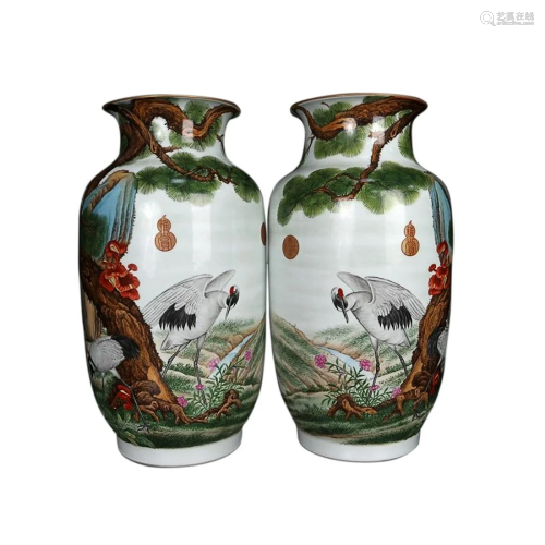 PAIR OF PAINTED ENAMEL 'CRANE AND PINE TREE' ROULEAU