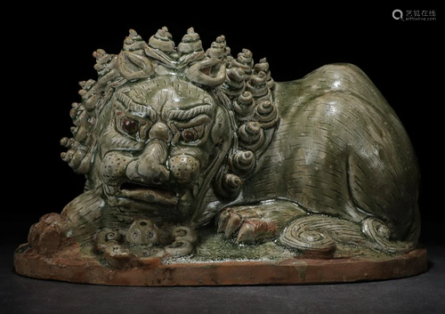 XIANGZHOU WARE RECLINED LION PENDANT