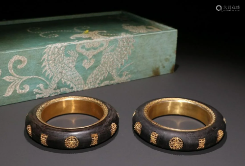 PAIR OF CHENXIANG WOOD GOLD FILLED BANGLES