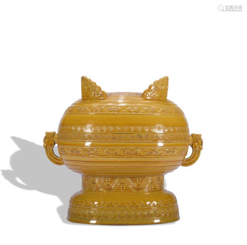 A yellow glazed jar and cover