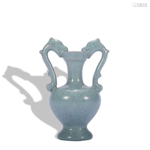 A celadon-glazed vase