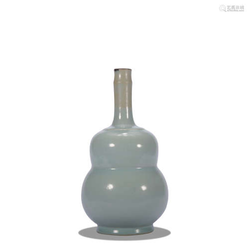 A celadon-glazed vase