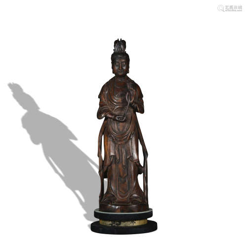 A wood statue of Guanyin