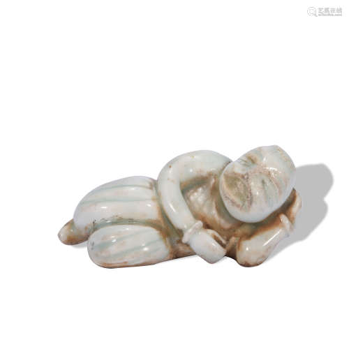 A celadon-glazed figure