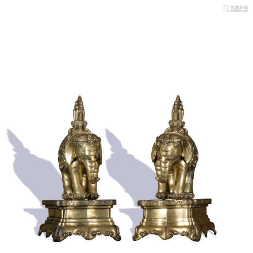 A pair of gilt-bronze elephant