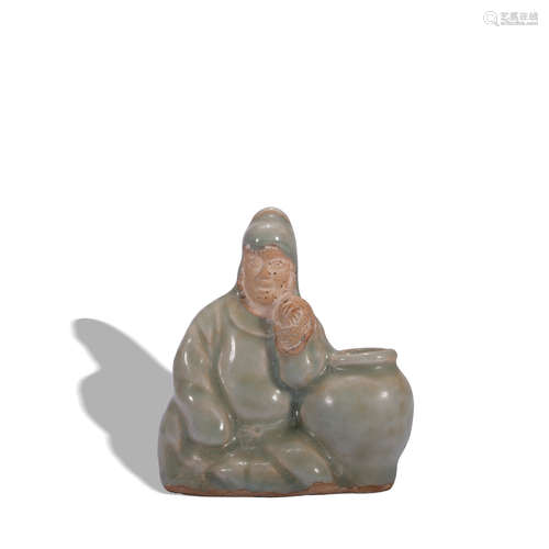 A celadon-glazed figure