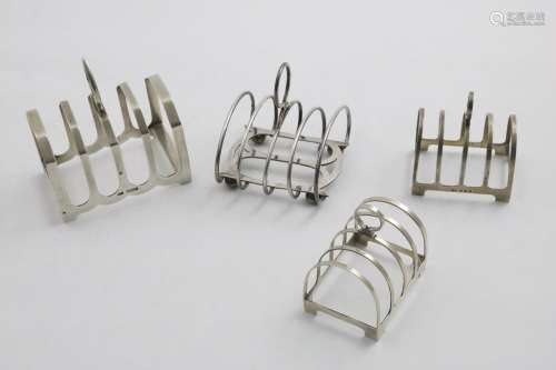 A PAIR OF GEORGE V SMALL TOAST RACKS with arched bars, by De...