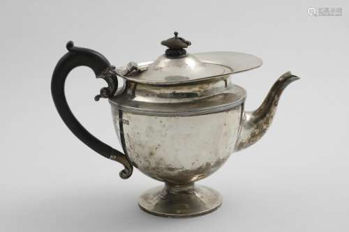 A GEORGE V VASE-SHAPED TEA POT with a 