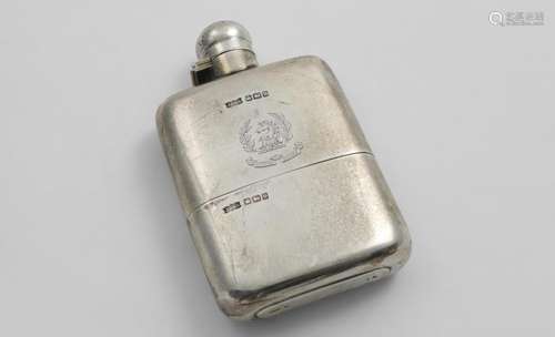 A GEORGE V SMALL RECTANGULAR SPIRIT FLASK with a pull-off cu...