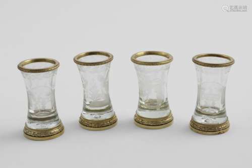 A SET OF FOUR LATE 19TH CENTURY FRENCH SILVERGILT-MOUNTED GL...