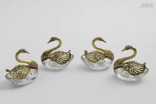 A SET OF FOUR LATE 20TH CENTURY CONTINENTAL SILVERGILT-MOUNT...