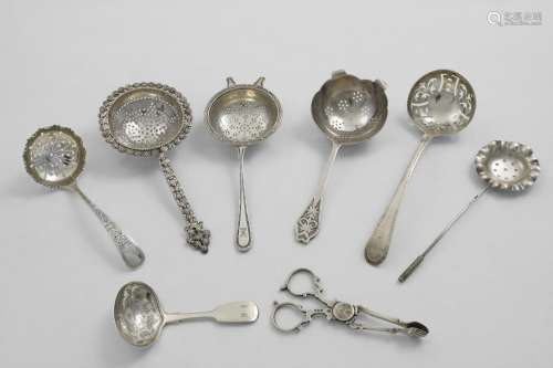 A MIXED LOT:- Two tea strainers, an Indian tea strainer, thr...