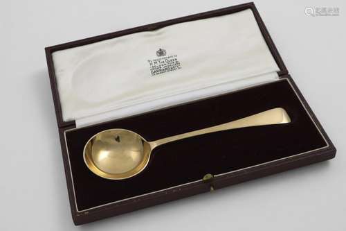 AN ELIZABETH II 9 CT. GOLD SPOON Old English pattern with a ...