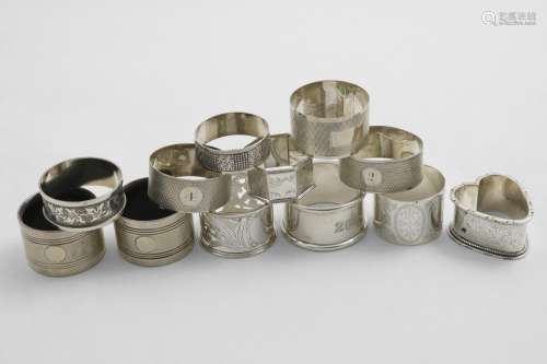 NAPKIN RINGS:- An engraved, heart-shaped example, an Edwardi...