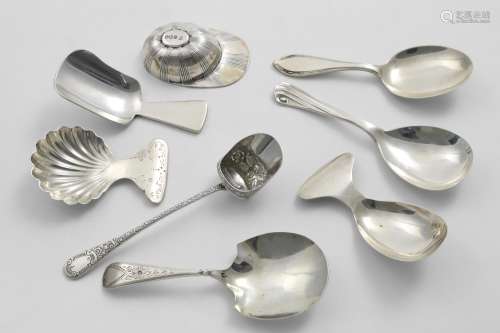 EIGHT VARIOUS GEORGE V CADDY SPOONS including a 