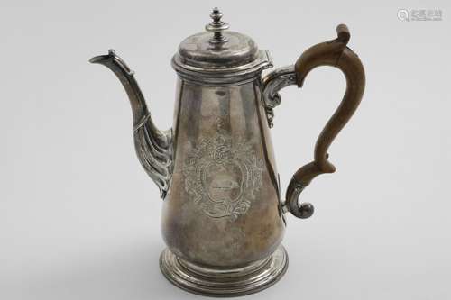 A GEORGE II TAPERING COFFEE POT with a tucked-in base, a spr...