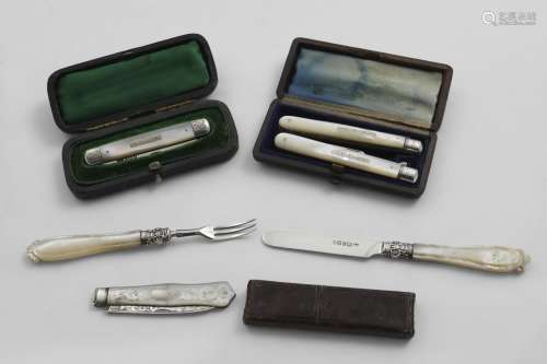 MOTHER-OF-PEARL MOUNTED FRUIT KNIVES & FORKS:- A cased Victo...