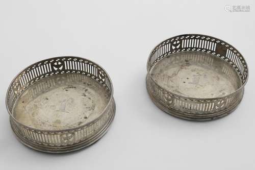 A PAIR OF GEORGE III PIERCED WINE COASTERS with fine-bead bo...