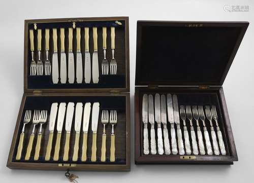 A GEORGE V CASED SET OF TWELVE IVORY HANDLED FISH KNIVES AND...