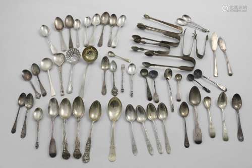 A QUANTITY OF ASSORTED SMALL SPOONS Six pairs of sugar tongs...