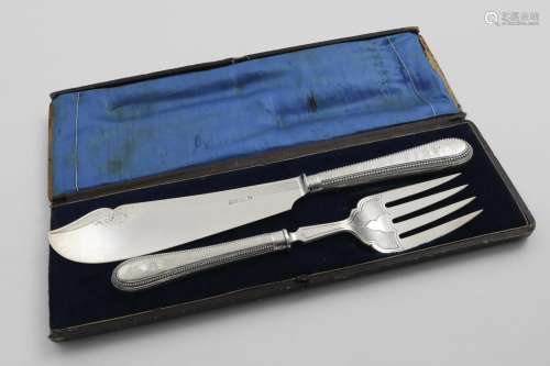 A VICTORIAN CASED PAIR OF FISH SERVERS with engine-turned de...