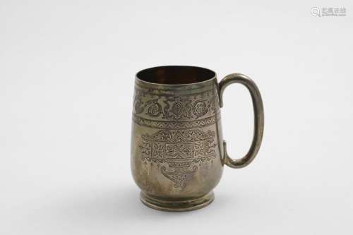A LATE VICTORIAN ENGRAVED CHRISTENING MUG with a c-shaped ha...