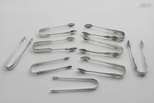 NINE ASSORTED PAIRS OF SUGAR TONGS in a variety of patterns,...