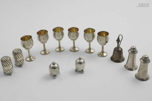 A MIXED LOT:- A set of six George V tot goblets with gilt in...