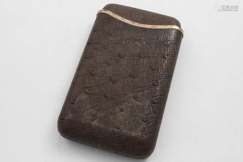 A GEORGE V 9 CT. GOLD MOUNTED OSTRICH LEATHER CIGAR CASE wit...