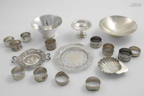 A MIXED LOT:- Twelve various napkin rings, a pierced stand, ...