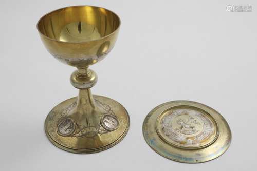 A LATE 19TH CENTURY FRENCH PARCELGILT CHALICE AND PATEN with...