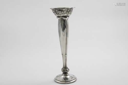 AN EDWARDIAN ART NOUVEAU VASE with embossed floral decoratio...