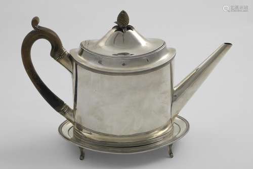 A GEORGE III PLAIN OVAL TEA POT with reed borders, a domed c...